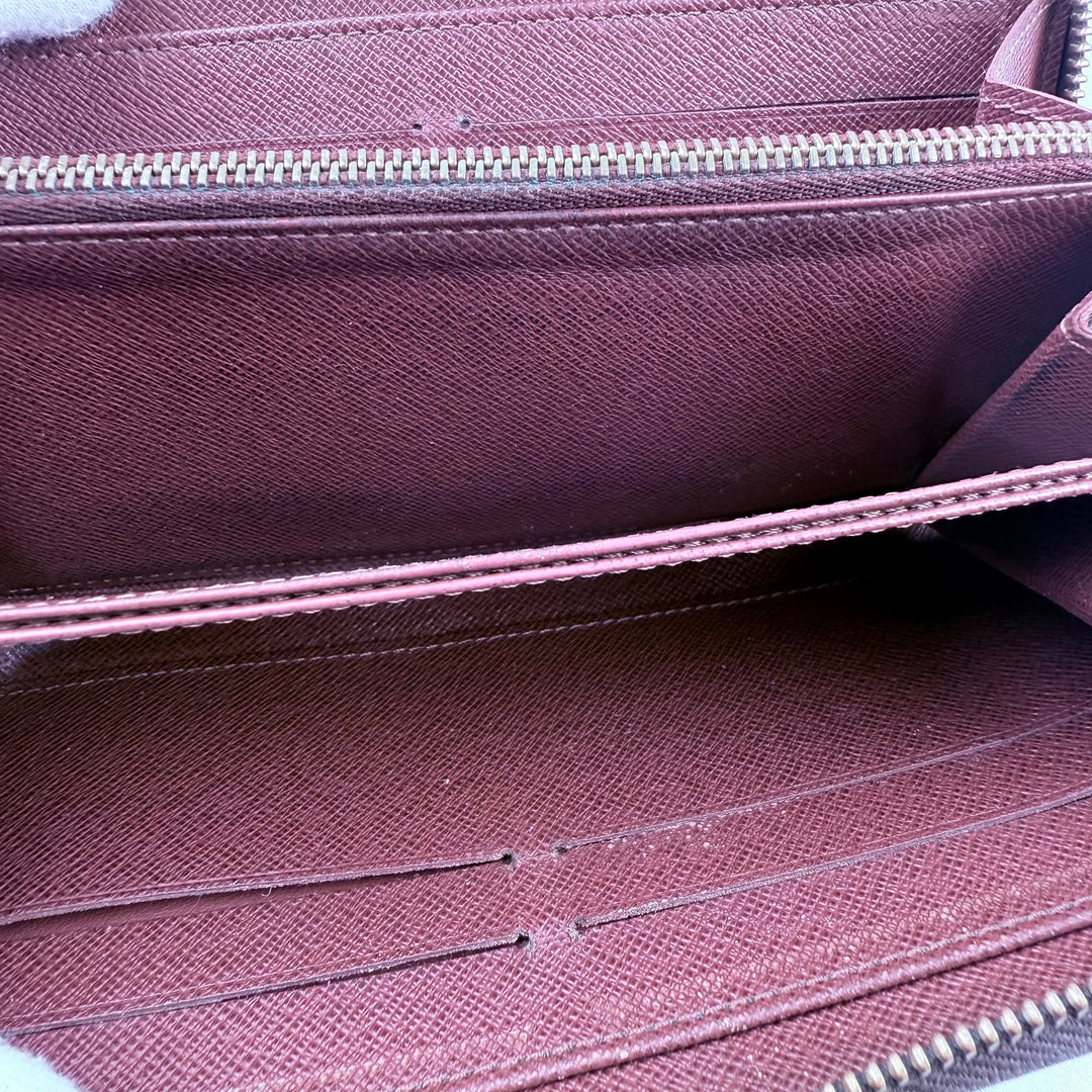 Louis Vuitton Brown Monogram Zippy Purse