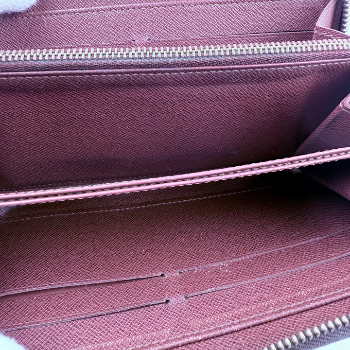 Louis Vuitton Brown Monogram Zippy Purse