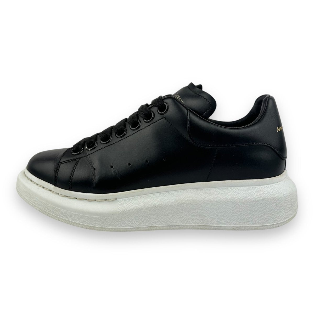 Black mcqueen trainers hotsell