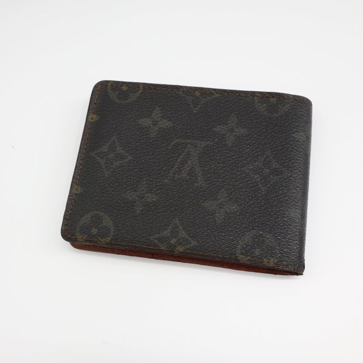 Louis Vuitton Bifold Brown Monogram Wallet Good Condition - Lux Central