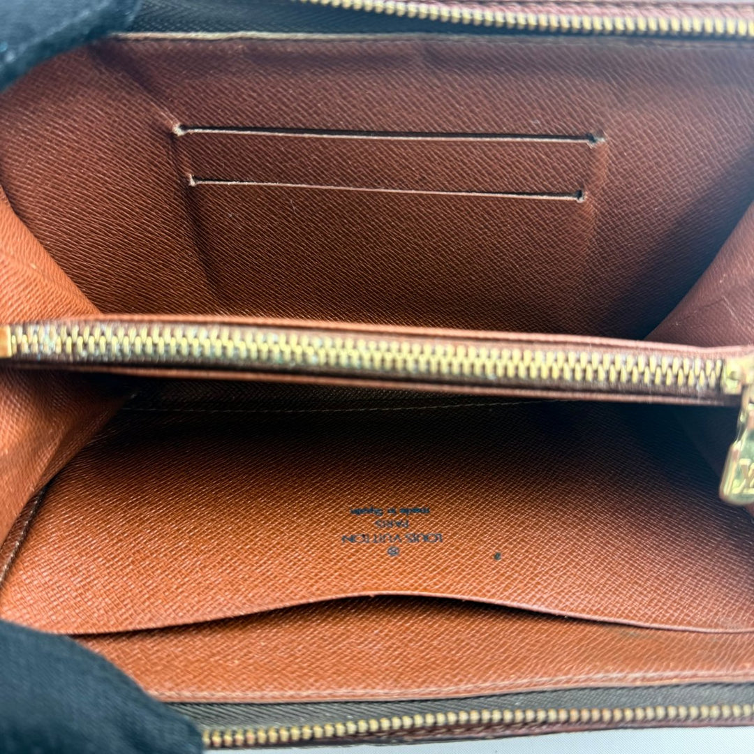 Louis Vuitton Brown Monogram Zippy Purse - Lux Central