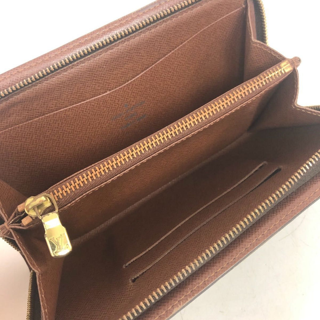 Louis Vuitton Brown Monogram Zippy Purse - Lux Central