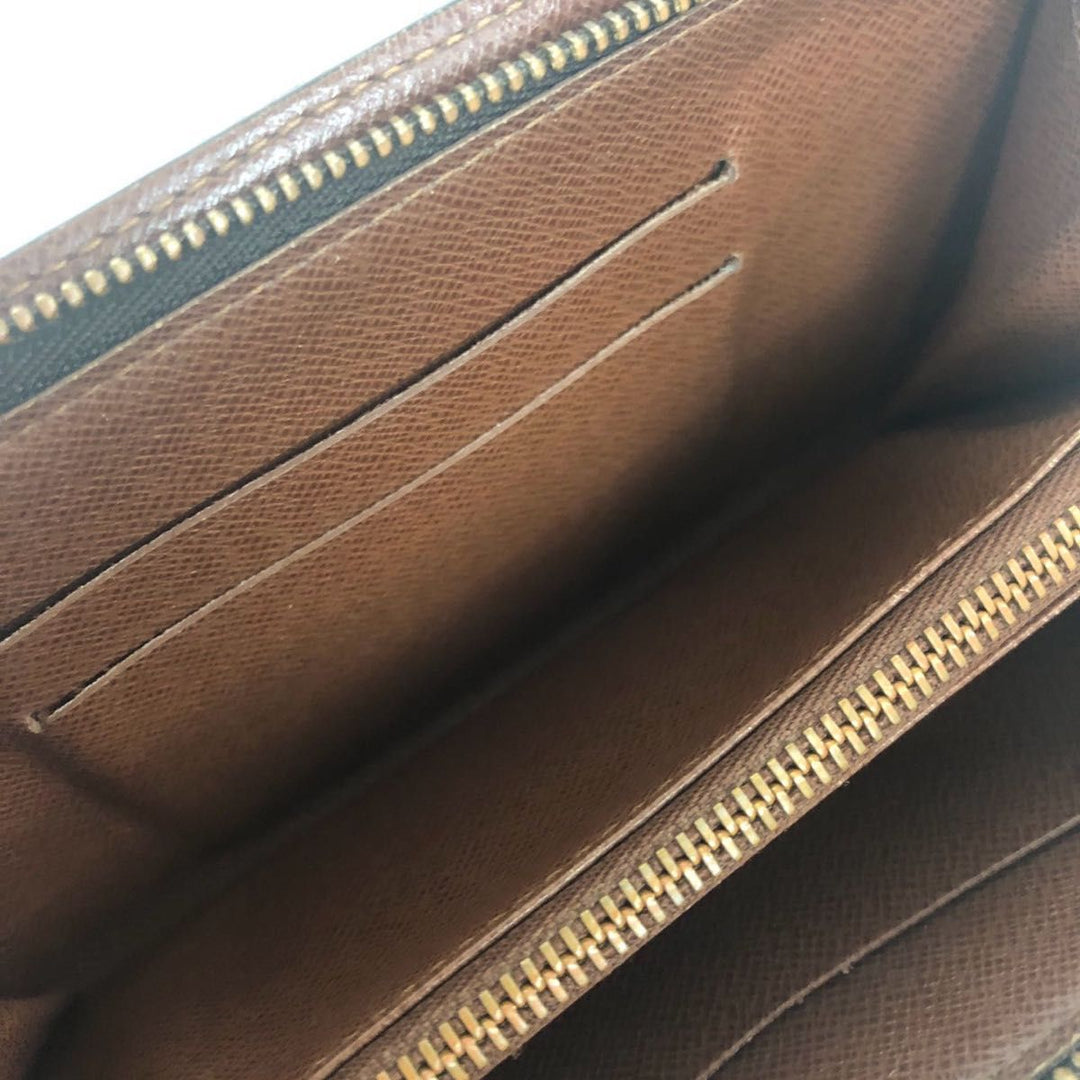 Louis Vuitton Brown Monogram Zippy Purse - Lux Central
