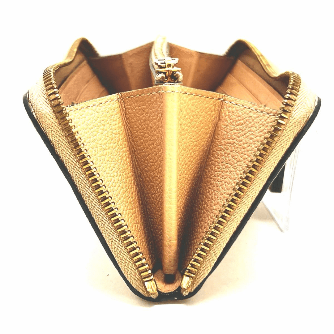 Louis Vuitton Clemence Beige Monogram Empreinte Leather Femme Wallet - Lux Central