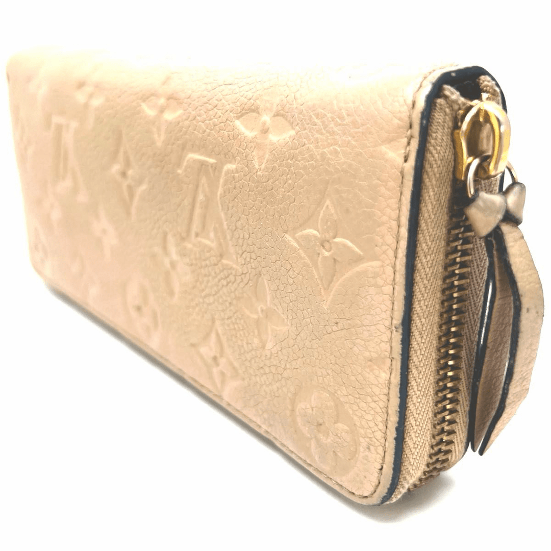 Louis Vuitton Clemence Beige Monogram Empreinte Leather Femme Wallet - Lux Central