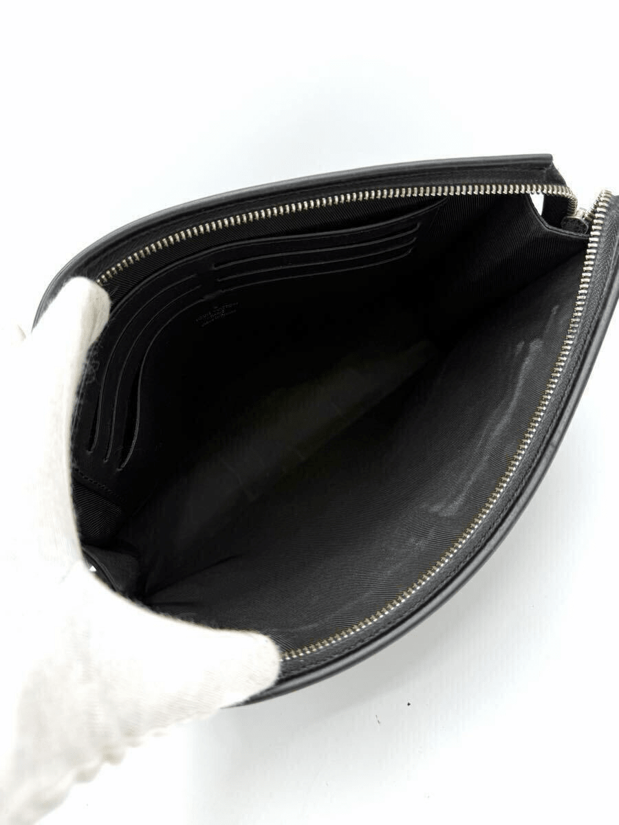 Louis Vuitton Pochette Voyage Black Taiga Pouch - Lux Central