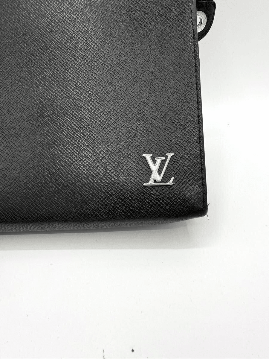 Louis Vuitton Pochette Voyage Black Taiga Pouch - Lux Central