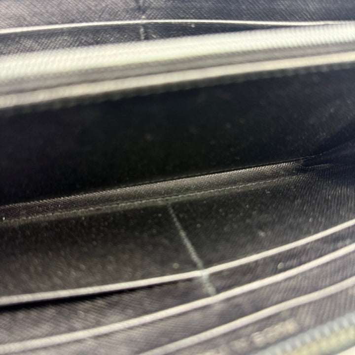 Prada Black Saffiano Leather Long Zippy Wallet - Lux Central